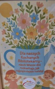Dyplom "Dla naszych Kochanych Bibliotekarzy - niech Wasze dni rozkwitają jak najpiękniejsze kwiaty"